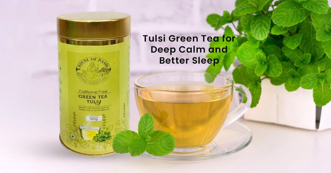 Tulsi green tea tin and glass cup with fresh mint leaves from House of Daadi